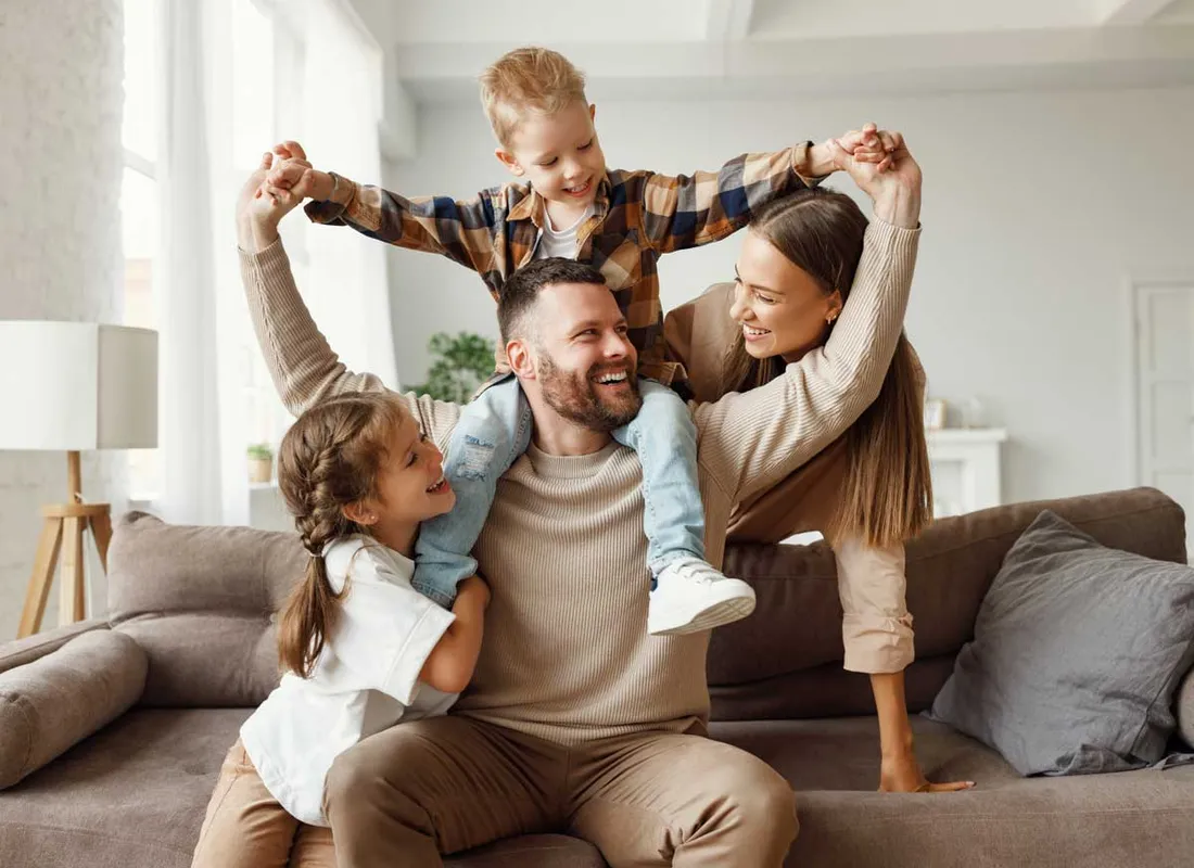 Family relaxing together on the couch