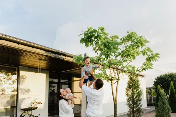 First-time homebuyers at their new front door