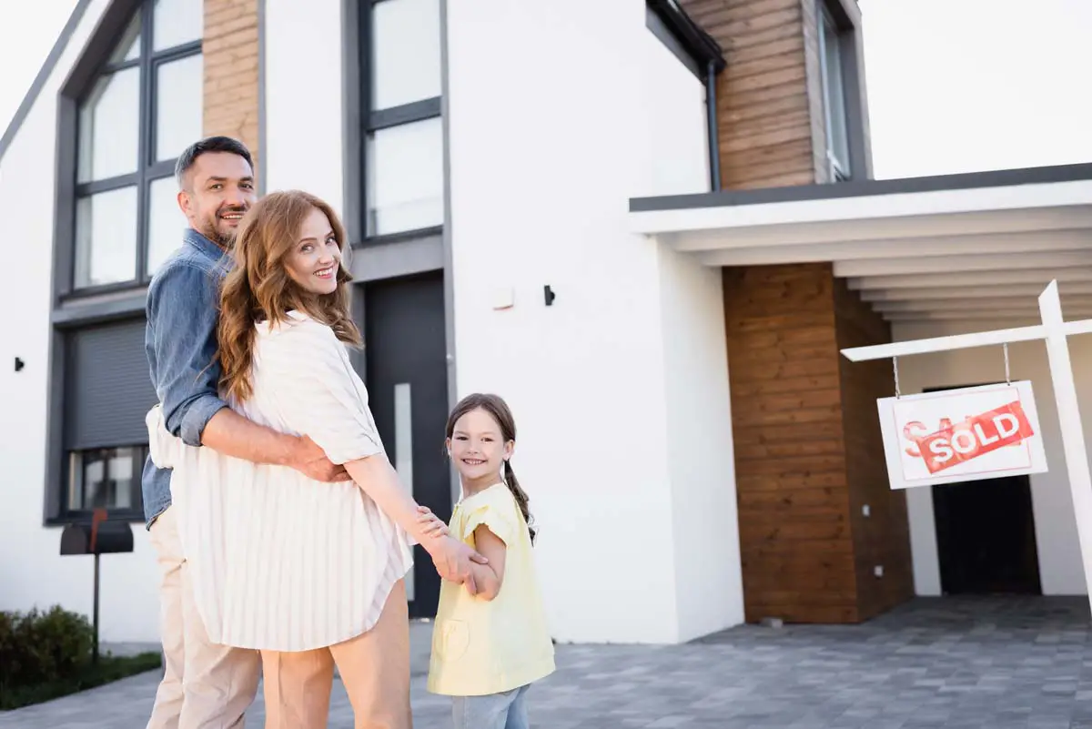 Family celebrating their new home