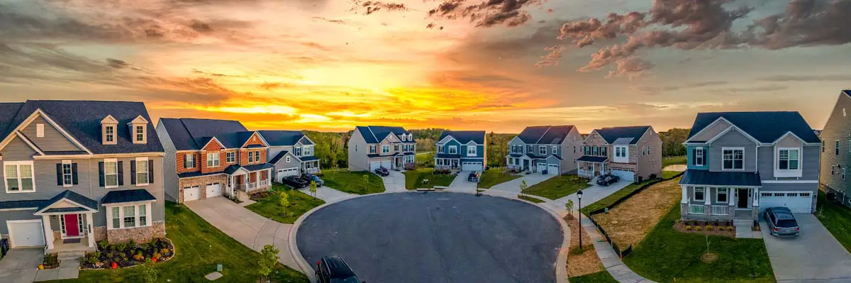 Suburban cul-de-sac with homes at sunset